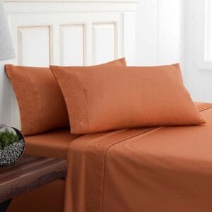 JUEGO DE SABANAS BRODERIE SANTORINI 1.5 PLAZAS - TERRACOTA